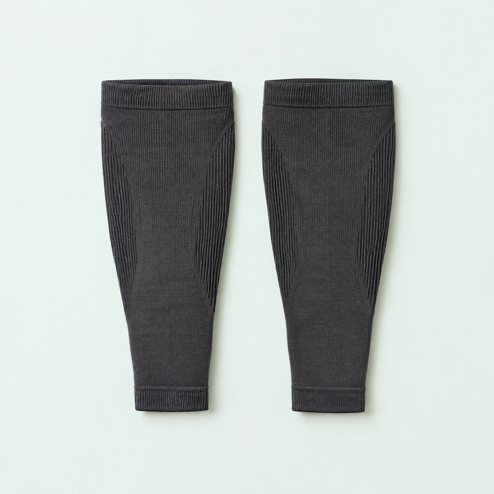 Pair of charcoal gray ribbed-knit calf sleeves laid flat